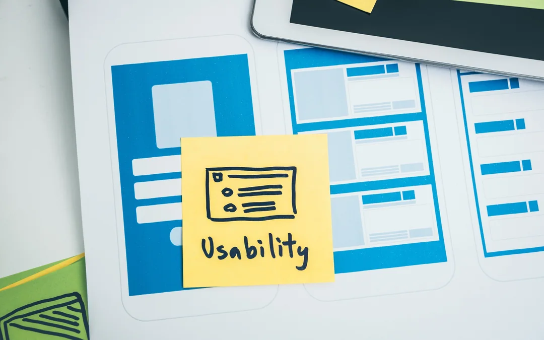 Website wireframes with a sticky note labelled Usability